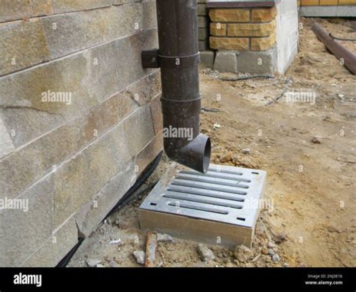 How are downpipes connected to surface water drainpipes?