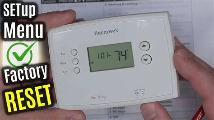 How do I reset my thermostat to factory settings?