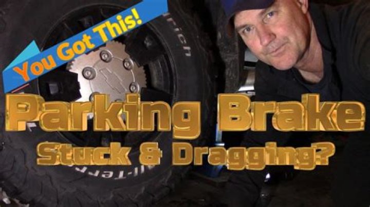 How do you get a stuck emergency brake to release?
