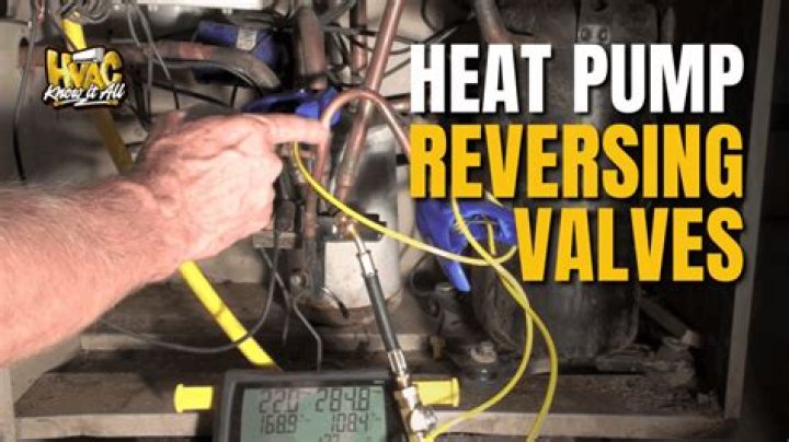 How does a heat pump reversing valve work?
