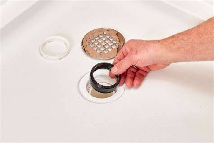 Should there be standing water in a shower drain?