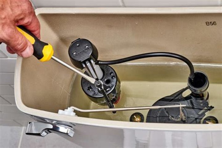What do I need to know about replacing a toilet tank?