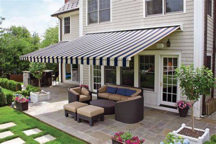 Why does my SunSetter awning retract on its own?
